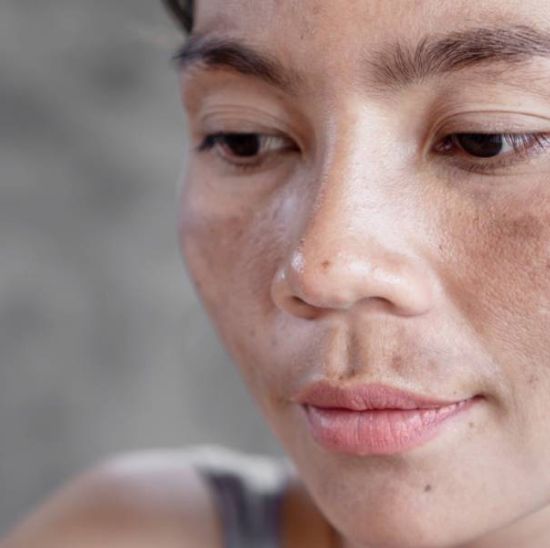 Woman with sun moustache