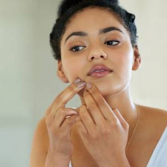 Girl looking into the mirror