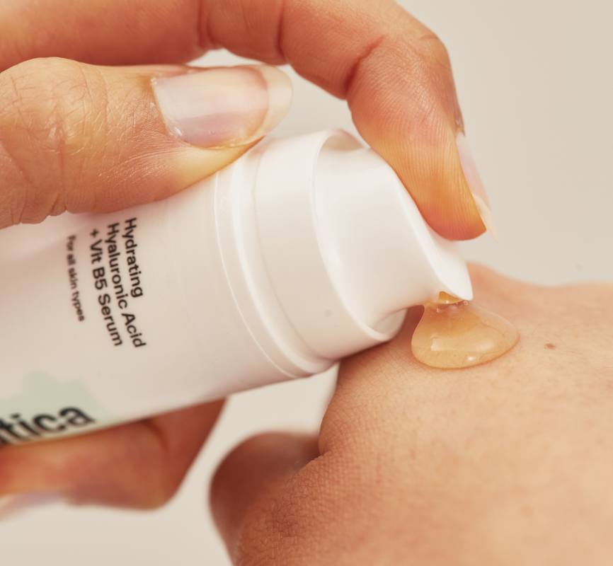 Model using Dermatica Hydrating Hyaluronic Acid + Vit B5 Serum